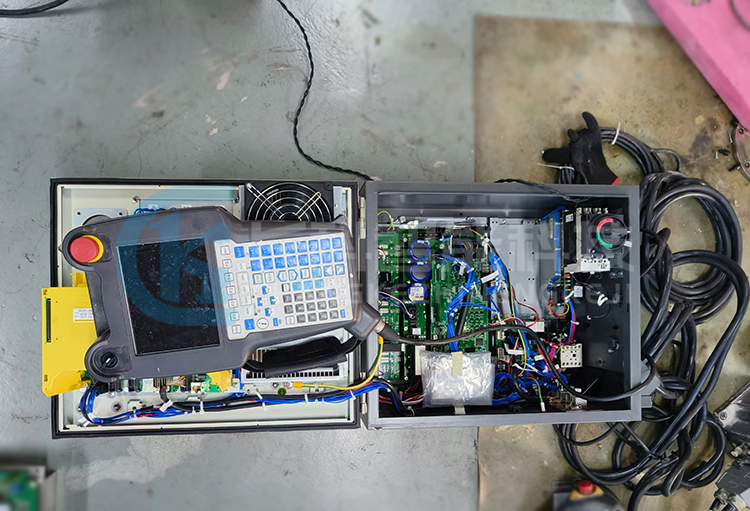 Repair the Fanuc robot LR Mate 200iD that has been submerged in water
